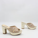SANDALES À TALONS EN CUIR TRESSÉS