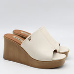 MULES À TALONS COMPENSÉES EN CUIR