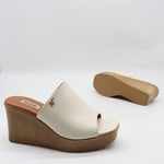 MULES À TALONS COMPENSÉES EN CUIR