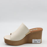 MULES À TALONS COMPENSÉES EN CUIR