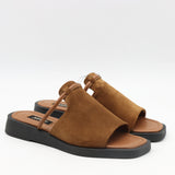 MULES PLATES EN DAIM CUIR