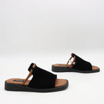 MULES PLATES EN DAIM CUIR