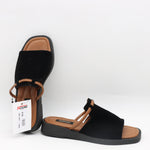 MULES PLATES EN DAIM CUIR