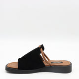 MULES PLATES EN DAIM CUIR