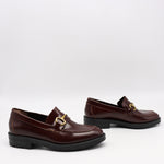 MOCASSINS EN CUIR ET MORS DORÉ