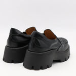 CHAUSSURES EN CUIR À SEMELLE CRANTÉE