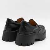CHAUSSURES EN CUIR À SEMELLE CRANTÉE