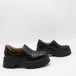 CHAUSSURES EN CUIR À SEMELLE CRANTÉE