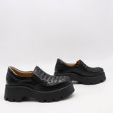 CHAUSSURES EN CUIR À SEMELLE CRANTÉE