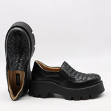 CHAUSSURES EN CUIR À SEMELLE CRANTÉE