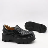 CHAUSSURES EN CUIR À SEMELLE CRANTÉE