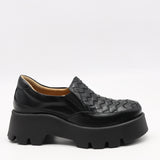 CHAUSSURES EN CUIR À SEMELLE CRANTÉE