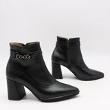BOTTINES À TALONS ET BOUT POINTU EN CUIR
