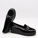 CHAUSSURES COMPENSÉES EN CUIR VERNIS