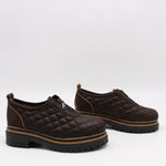 CHAUSSURES MATELASSÉE EN CUIR ET FERMETURE DEVANT