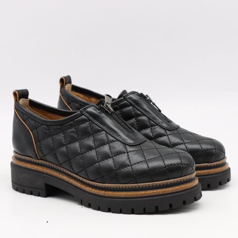 CHAUSSURES MATELASSÉE EN CUIR ET FERMETURE DEVANT