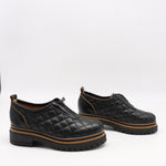 CHAUSSURES MATELASSÉE EN CUIR ET FERMETURE DEVANT