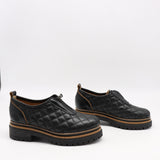 CHAUSSURES MATELASSÉE EN CUIR ET FERMETURE DEVANT