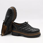 CHAUSSURES MATELASSÉE EN CUIR ET FERMETURE DEVANT
