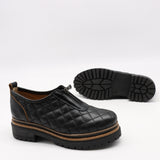 CHAUSSURES MATELASSÉE EN CUIR ET FERMETURE DEVANT