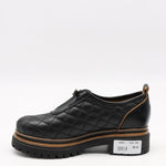 CHAUSSURES MATELASSÉE EN CUIR ET FERMETURE DEVANT