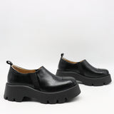 CHAUSSURES EN CUIR À SEMELLE CRANTÉE