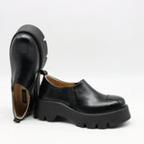 CHAUSSURES EN CUIR À SEMELLE CRANTÉE