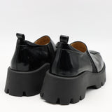 CHAUSSURES EN CUIR À SEMELLE CRANTÉE