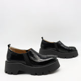 CHAUSSURES EN CUIR À SEMELLE CRANTÉE