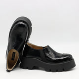 CHAUSSURES EN CUIR À SEMELLE CRANTÉE