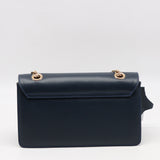 SAC À MAIN EN CUIR ET CHAÎNE DORÉ