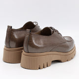 CHAUSSURES EN CUIR VERNIS ET SEMELLE CRANTÉE