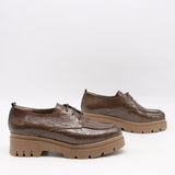 CHAUSSURES EN CUIR VERNIS ET SEMELLE CRANTÉE