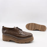 CHAUSSURES EN CUIR VERNIS ET SEMELLE CRANTÉE