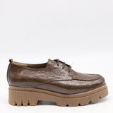 CHAUSSURES EN CUIR VERNIS ET SEMELLE CRANTÉE