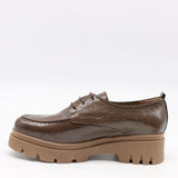 CHAUSSURES EN CUIR VERNIS ET SEMELLE CRANTÉE