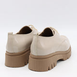 CHAUSSURES EN CUIR VERNIS ET SEMELLE CRANTÉE