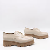 CHAUSSURES EN CUIR VERNIS ET SEMELLE CRANTÉE