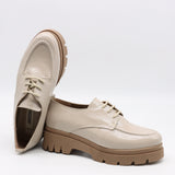 CHAUSSURES EN CUIR VERNIS ET SEMELLE CRANTÉE