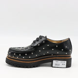 CHAUSSURES EN CUIR À STRASS CLOUS ET SEMELLE CRANTÉE