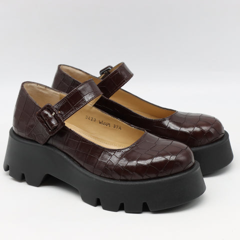 BABIES EN CUIR VERNIS À SEMELLE CRANTÉE