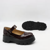 BABIES EN CUIR VERNIS À SEMELLE CRANTÉE