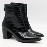 BOTTINES À TALONS ET BOUT POINTU EN CUIR