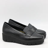 MOCASSINS COMPENSÉES EN CUIR À SEMELLE CRANTÉE