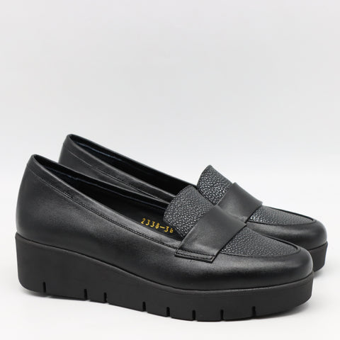 MOCASSINS COMPENSÉES EN CUIR À SEMELLE CRANTÉE