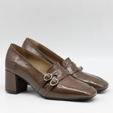 ESCARPINS À DOUBLES BOUCLES EN CUIR VERNIS