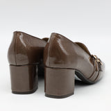 ESCARPINS À DOUBLES BOUCLES EN CUIR VERNIS