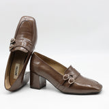 ESCARPINS À DOUBLES BOUCLES EN CUIR VERNIS