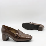 ESCARPINS À DOUBLES BOUCLES EN CUIR VERNIS