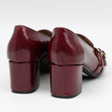 ESCARPINS À DOUBLES BOUCLES EN CUIR VERNIS